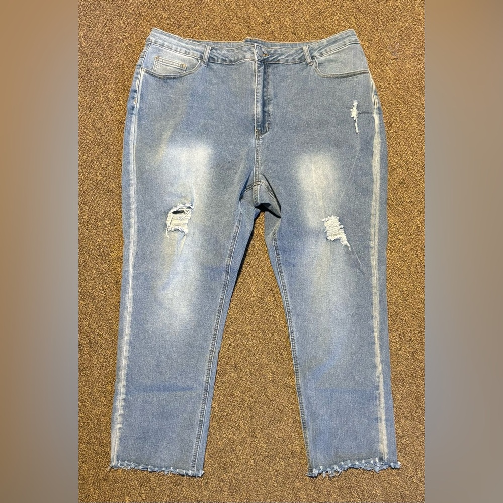 3 for $30. Plus High Waist Ripped Raw
Trim Skinny Jeans
